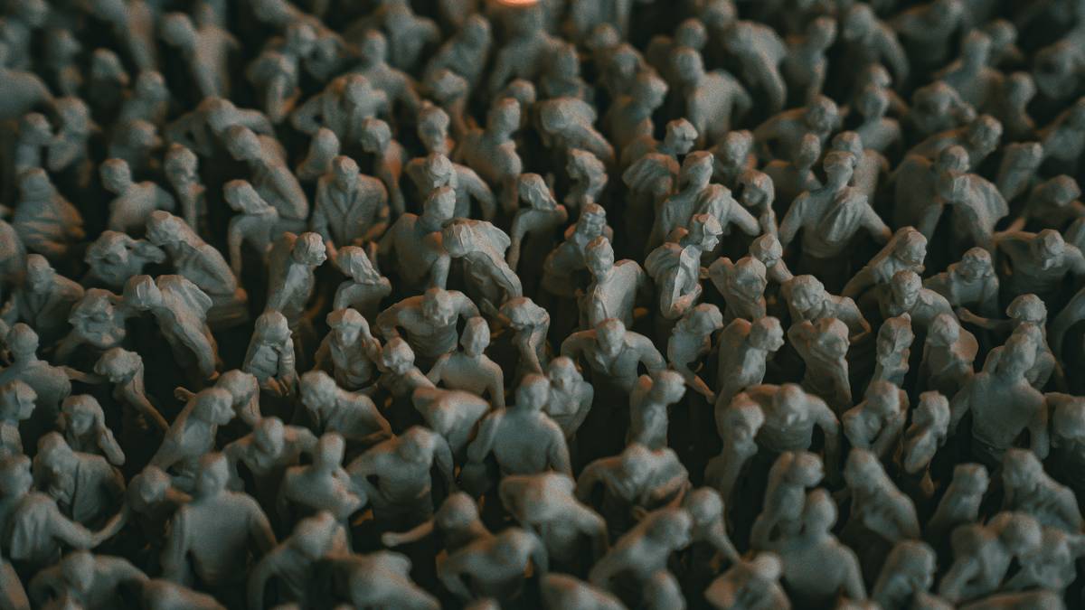 A crowd of small gray human figures packed together.