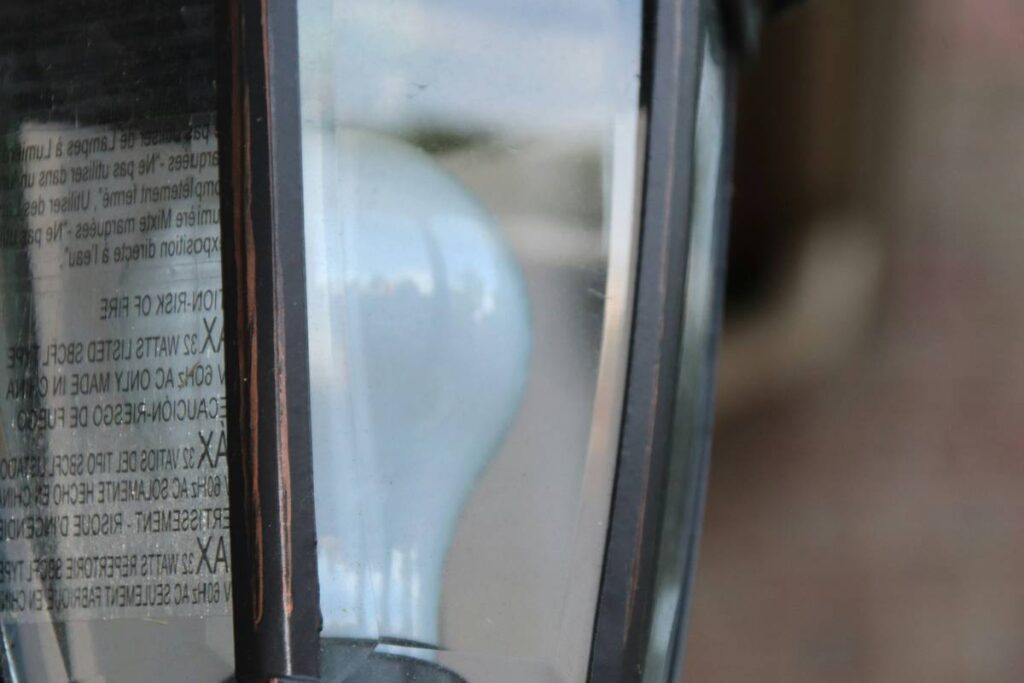 Close-up of a light bulb inside a lantern