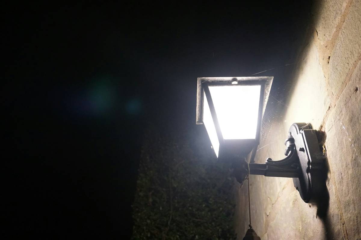 Comparison of three types of fitting wall mounted outside security lights showing durability and performance differences